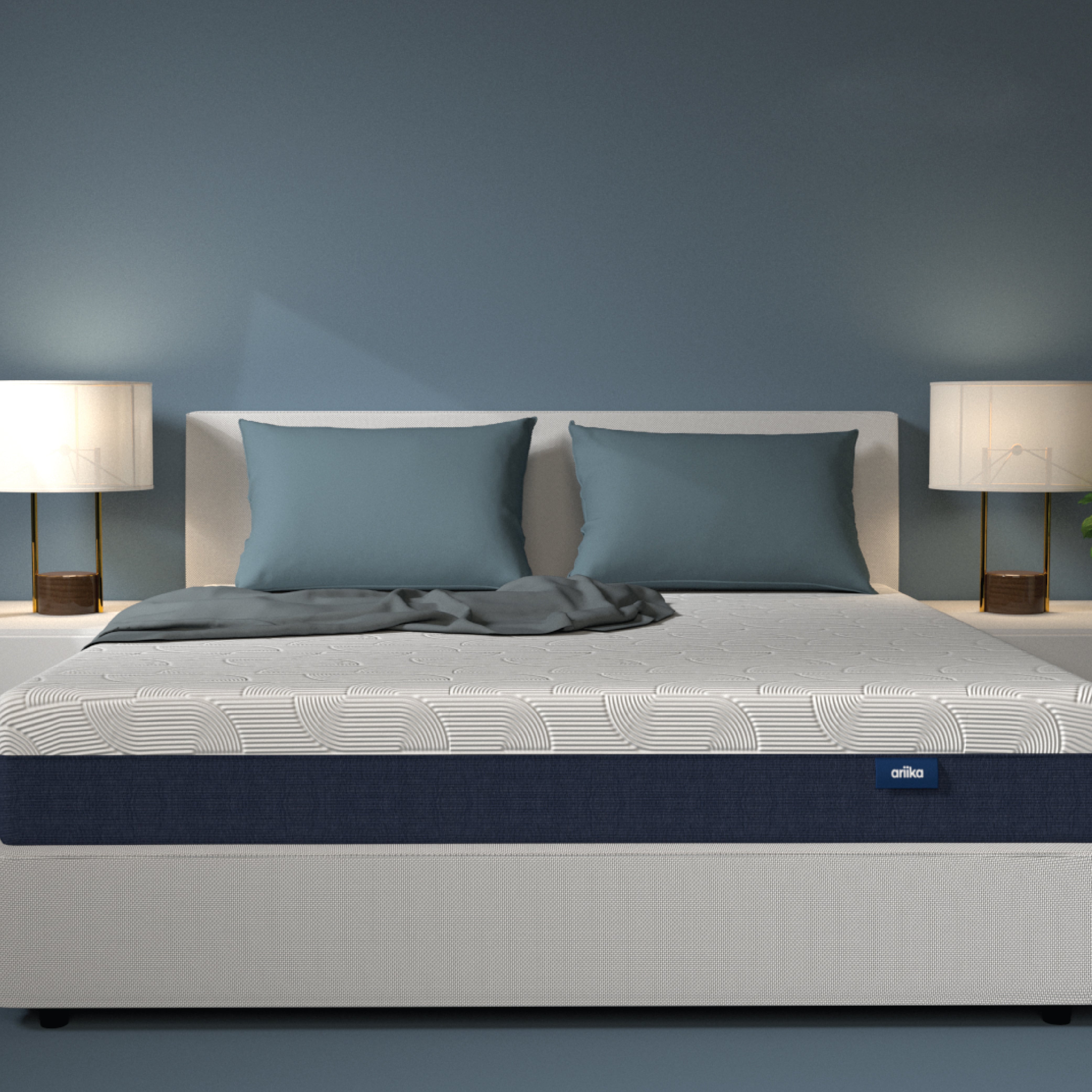High quality latex pocket spring mattress by Ariika, designed for a comfortable and supportive bedroom setup.