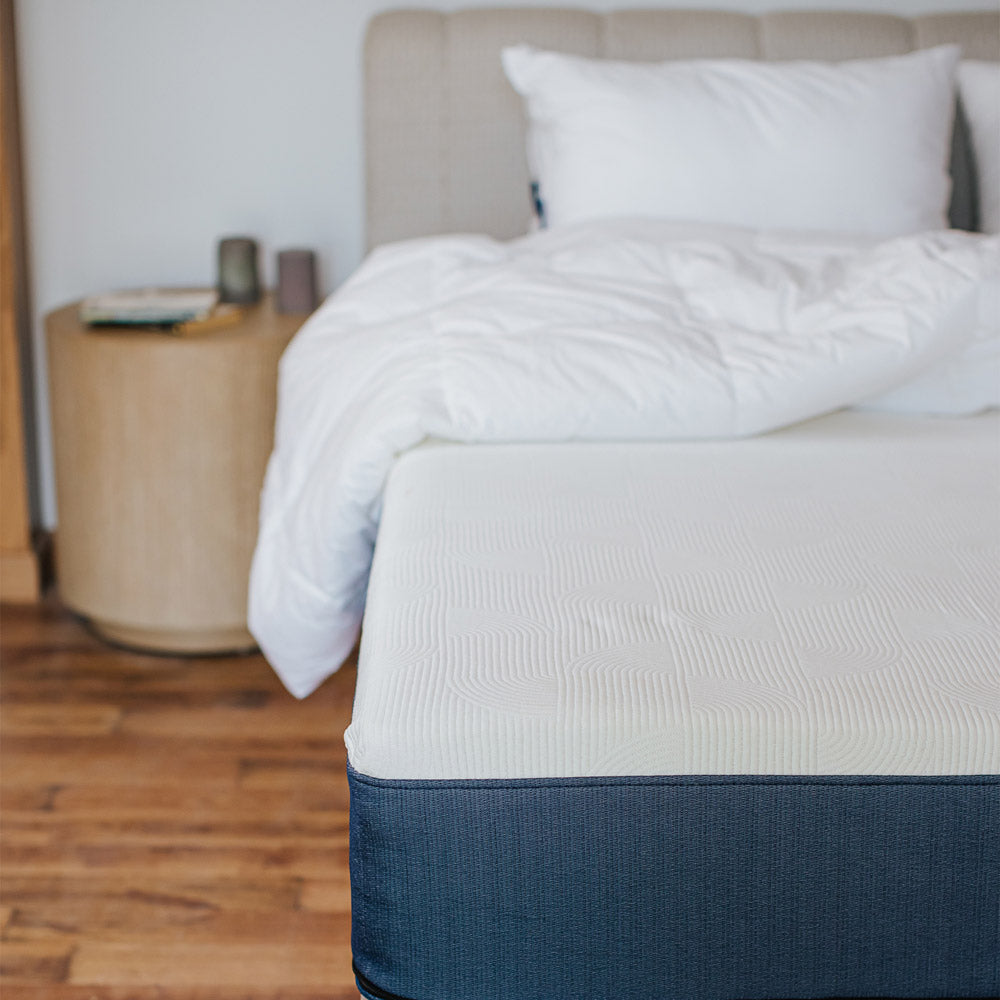 High quality latex pocket spring mattress by Ariika, designed for a comfortable and supportive bedroom setup.