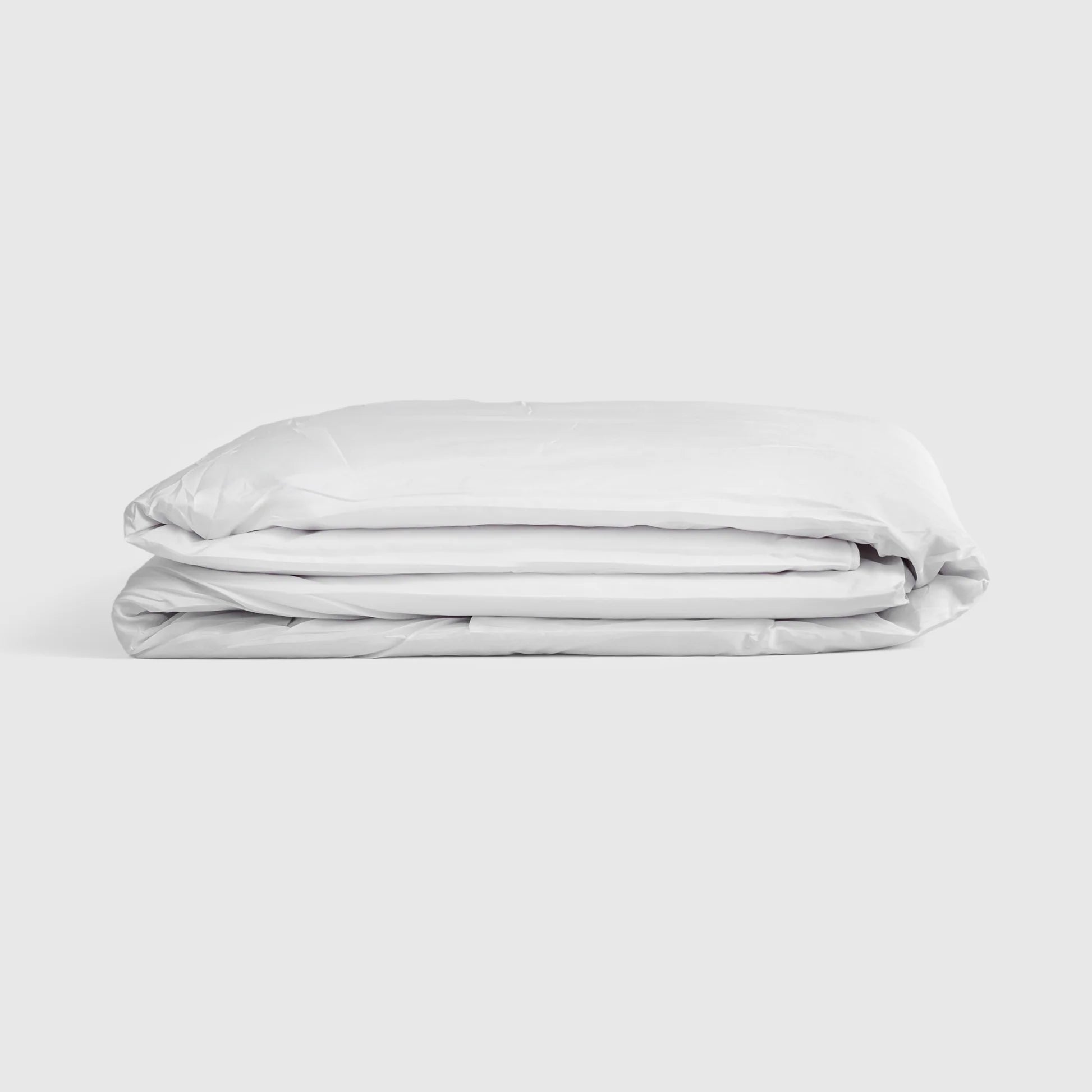 Summer Snooze navy hybrid mattress combining natural latex, memory foam, and pocket springs for a medium firm cooling sleep.
