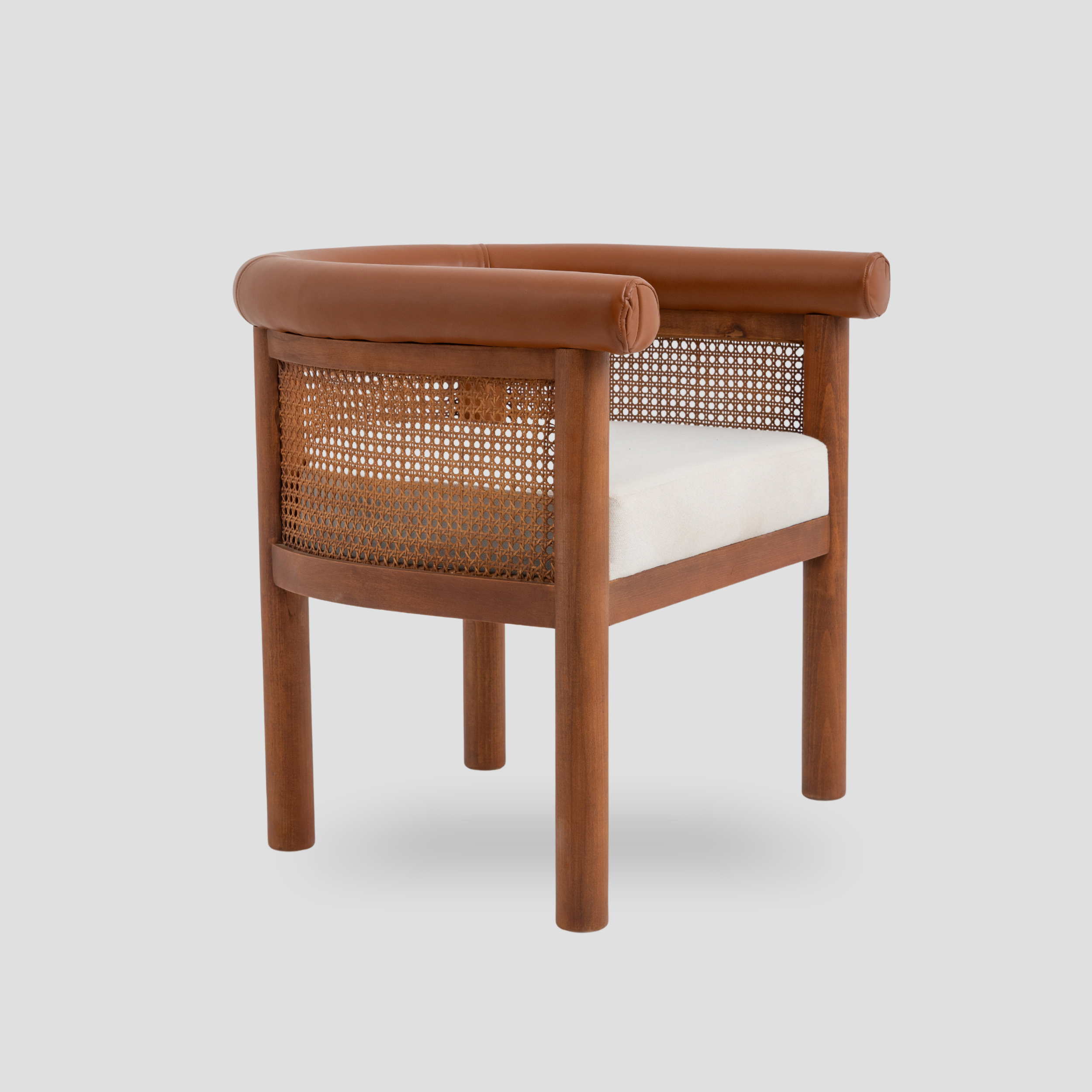 Amber Cane Barrel Armchair in cane back and beech wood, featuring mid century modern styling.