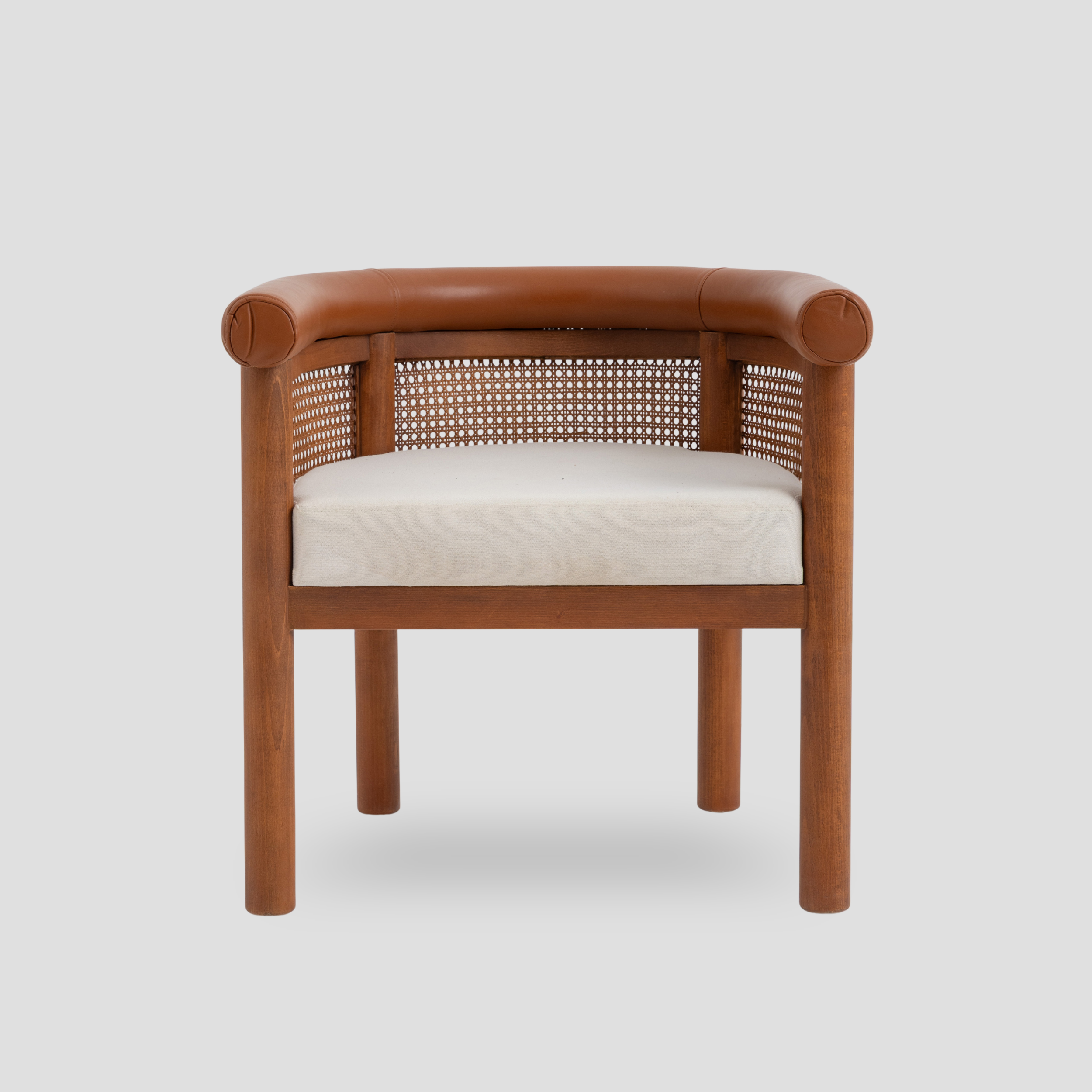 Amber Cane Barrel Armchair in cane back and beech wood, featuring mid century modern styling.