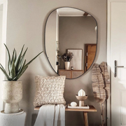 Cait Curved Edge Mirror, featuring modern mirror styling, featuring a curved mirror design.