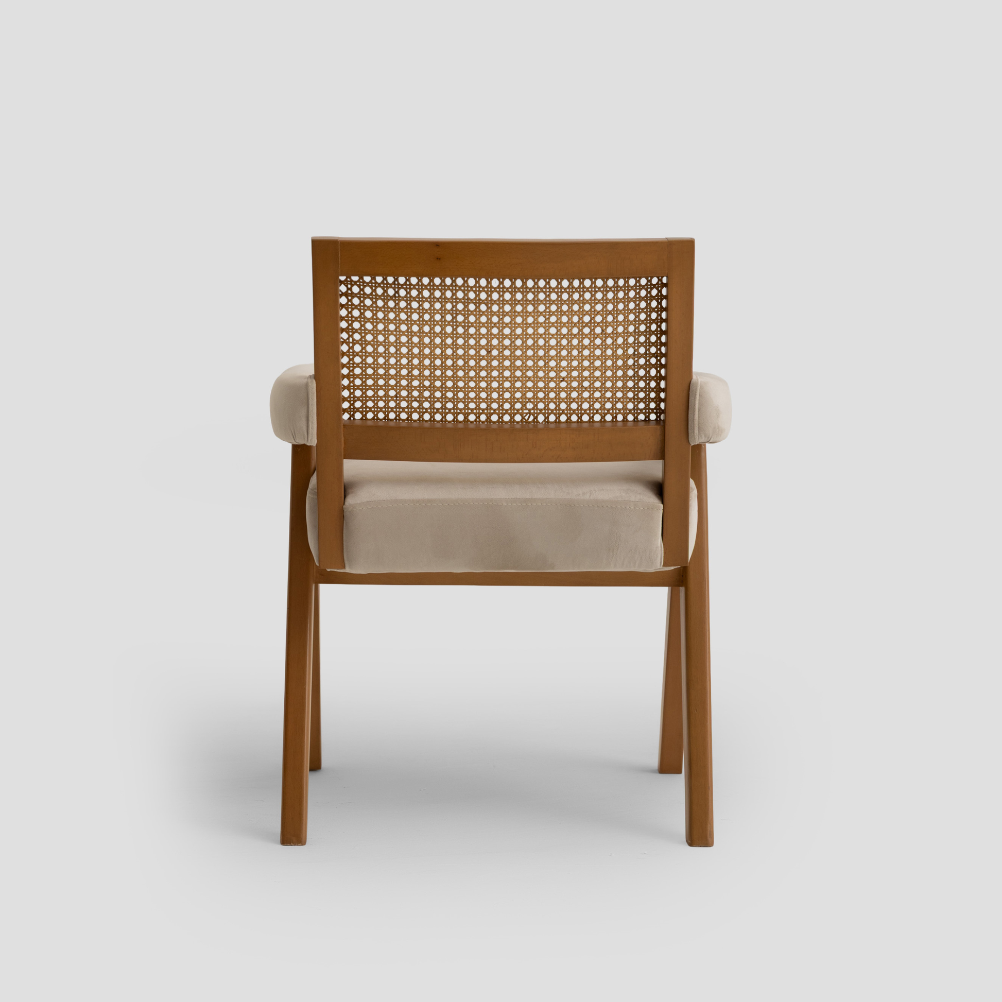 Elaf Caned Armchair in cane back, beech wood, and padded seat, featuring mid century styling.
