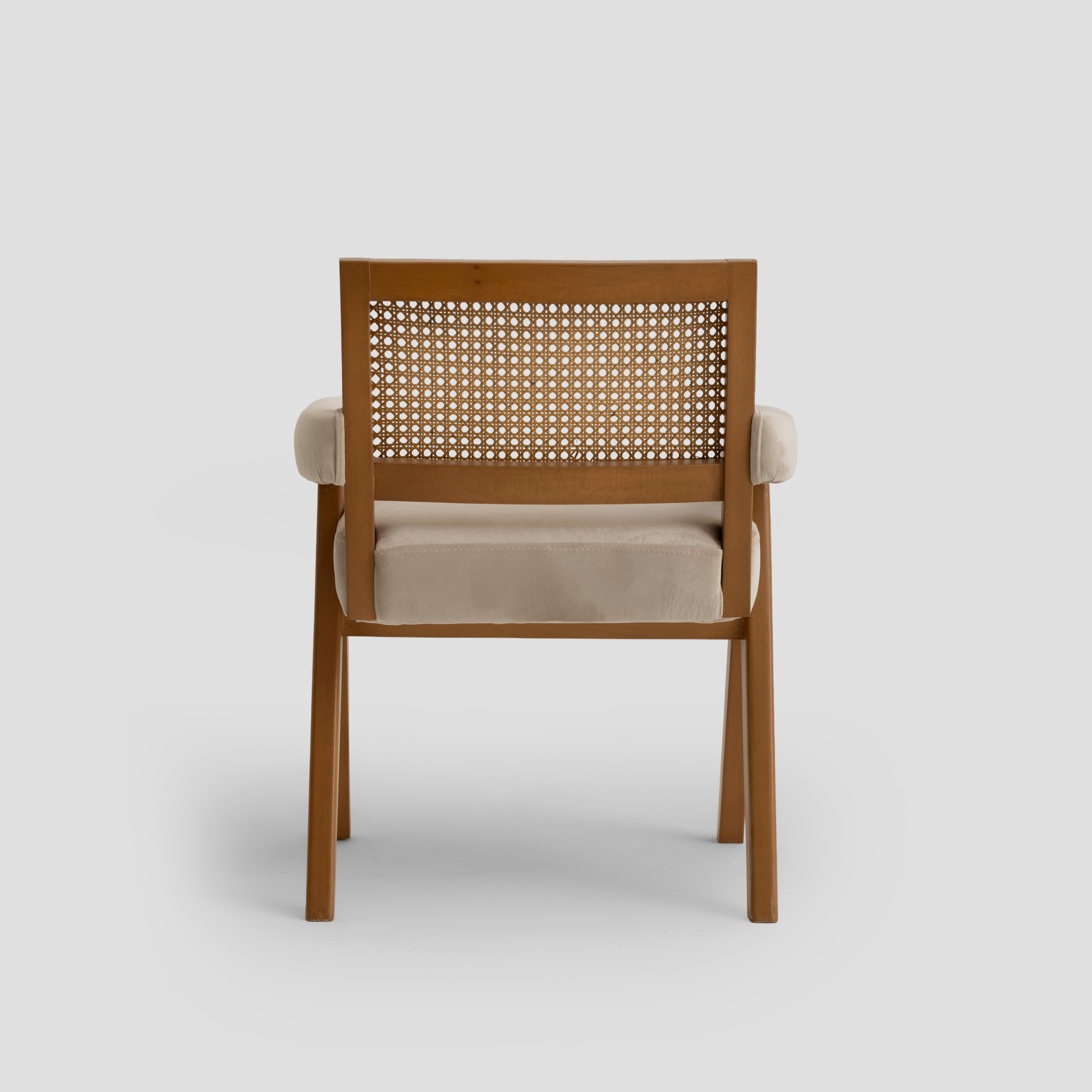 Elaf Caned Armchair in cane back, beech wood, and padded seat, featuring mid century styling.