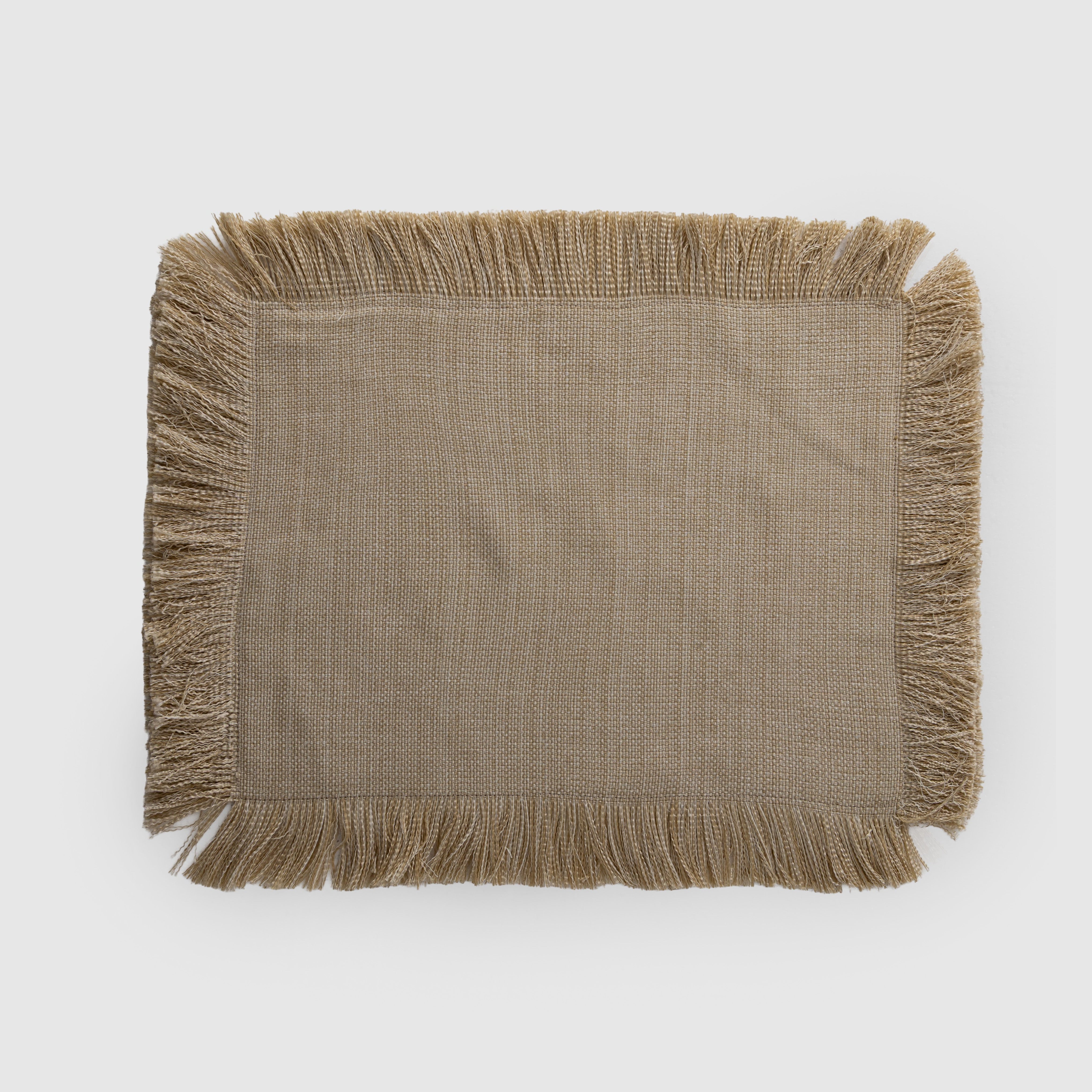 Fringed Jute Placemat Set in table linens, featuring boho dining styling, featuring a handmade tableware design.