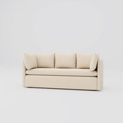 Modern family room three seater sofa featuring a solid wood frame and fabric upholstery.