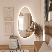 Teardrop Wall Mirror, featuring modern styling, perfect for hallway, with tall and black frame.