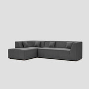 Modern floor sitting L shape modular sectional sofa with a beech frame and polyester cushions.
