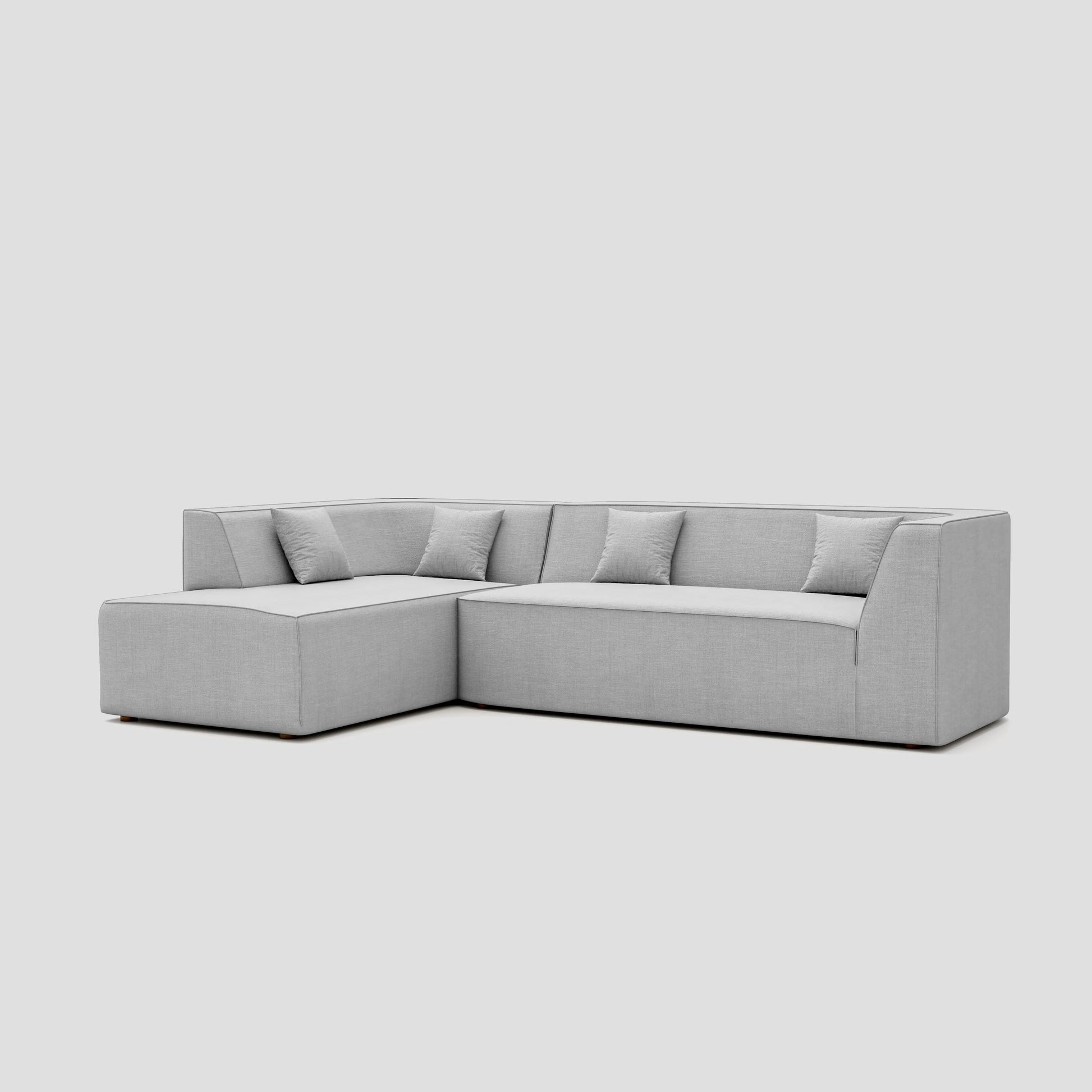 Modern floor sitting L shape modular sectional sofa with a beech frame and polyester cushions.
