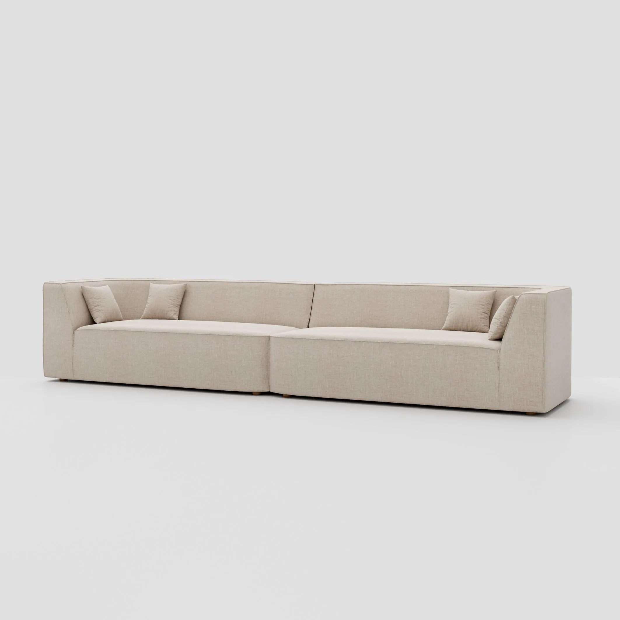 Modern linear three seater floor sitting modular sofa with a tuxedo arm beech frame.