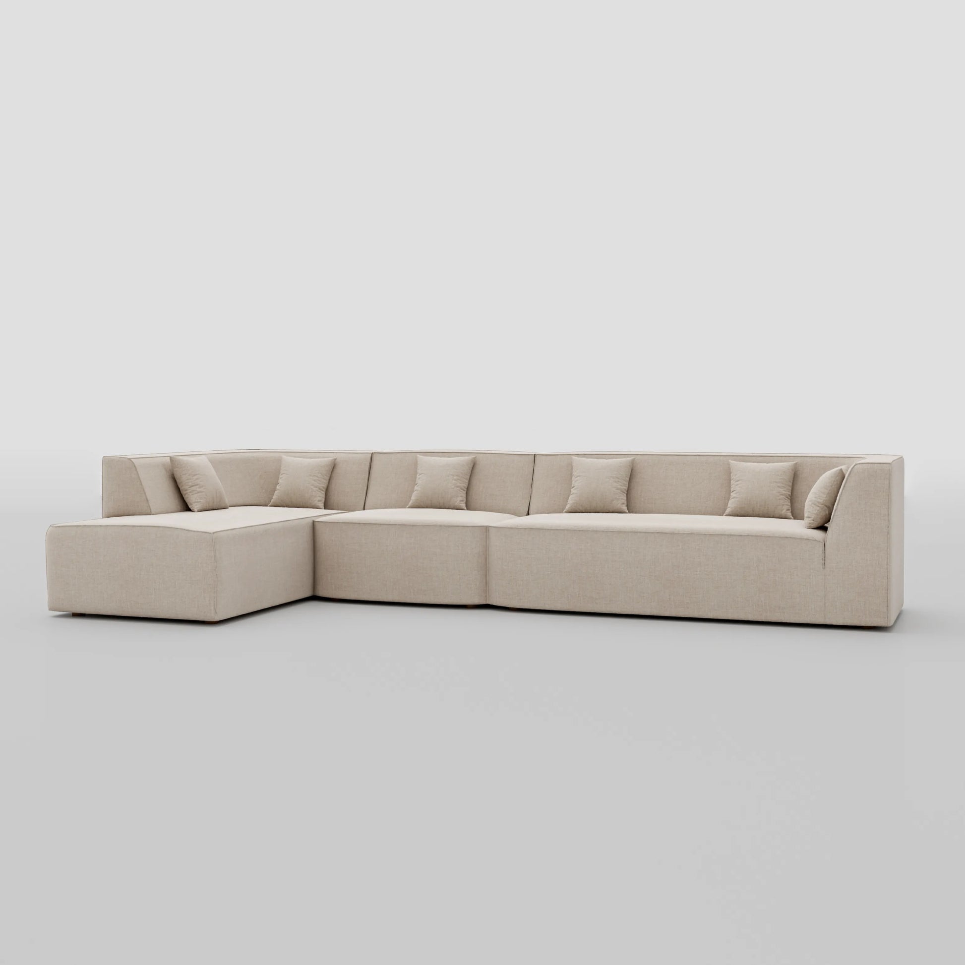 Large floor sitting L shape modular sofa with a pillow back beech frame design.