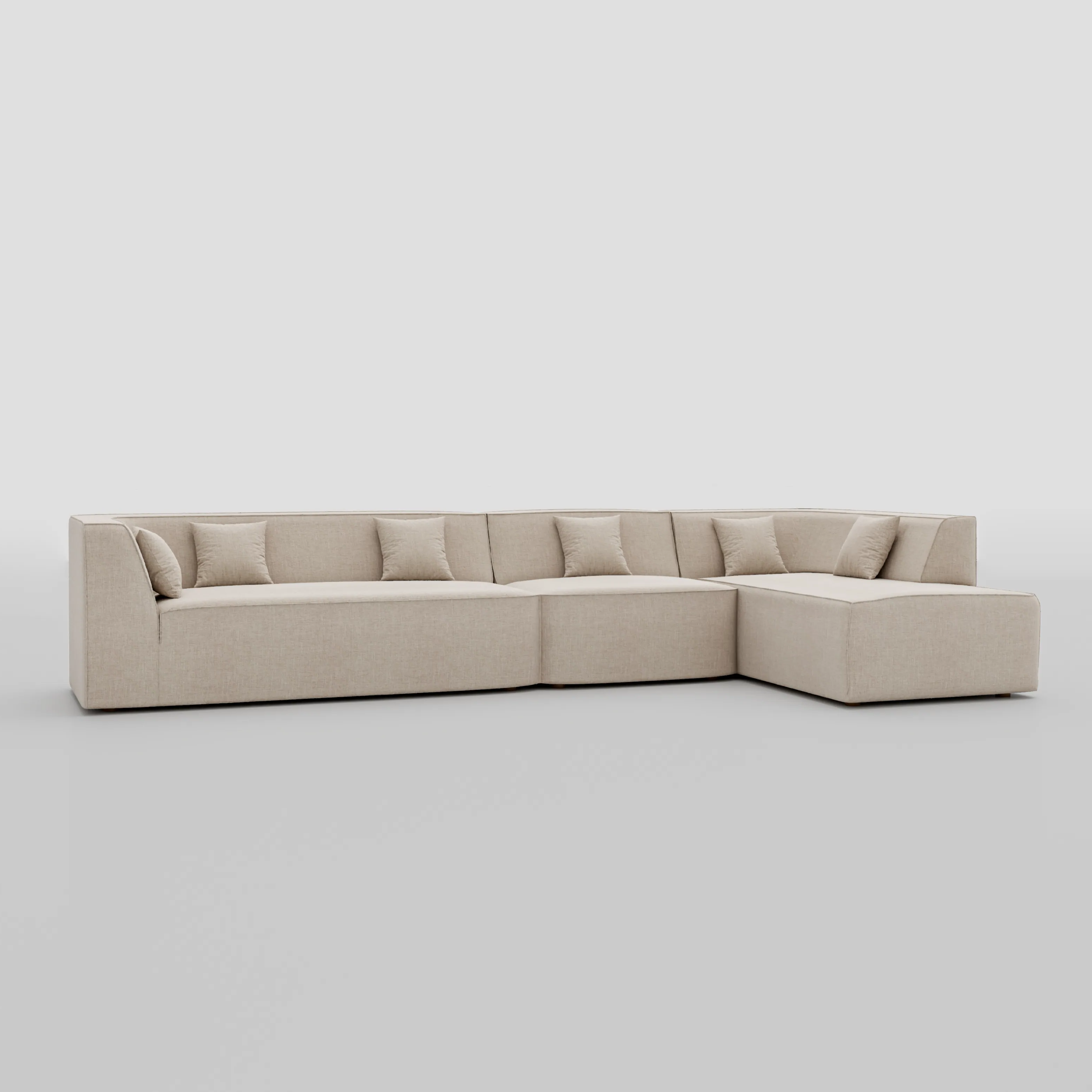 Large floor sitting L shape modular sofa with a pillow back beech frame design.